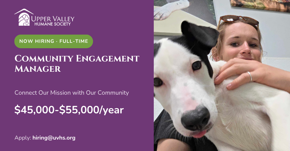 A woman with sunglasses on her head holds a white dog with black ears and a black nose. The text reads Upper Valley Humane Society now hiring - full-time Community Engagement Manager. Connect Our Mission with Our Community. $45,000-$55,000/year. Apply: hiring@uvhs.org